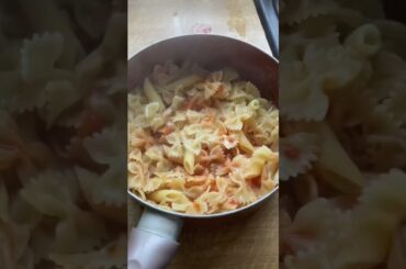 Italian cherry tomato and pancetta pasta with grated cheese
