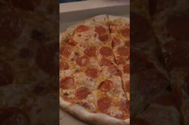 Cutting a pizza with a special slicer