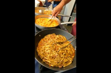 Cooking Pans of Italian Pasta. Pepper Festival
