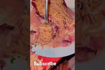 Italian superghetti made with red wine and purple cabbage.!