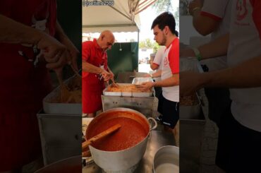 Cooking Italian Tagliatelle Linguine With Tanks of Sauce. "Mangialonga" 2022 La Morra. Food Run