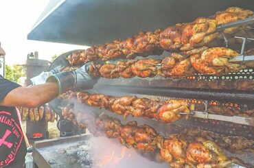 Huge Grill Festival of Pork Ribs and Roosters. Italy Street Food Event