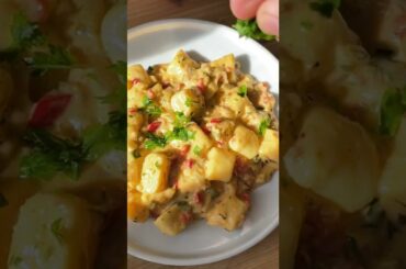 Creamy gnocchi with prosciutto and vegetables