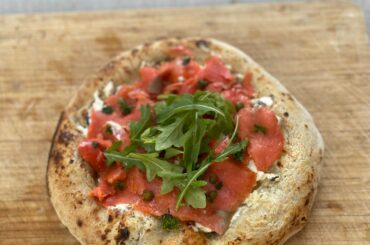 Neapolitan style salmon lox with jalapeño cream cheese base. Made in ooni with 48 hour dough. 10% spelt flour. 90% 00.