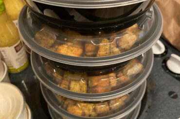 some absolutely scrumptious croutons from olive garden. off screen is another 10 stacks of croutons.