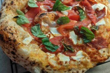 Putting the garden tomatoes and basil to good use!