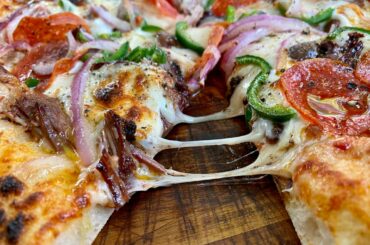 Smoked Brisket, black olives, red onions, jalapeños, pepperoni, mozzarella and provolone cheeses. 72 hour poolish dough, 70% hydration