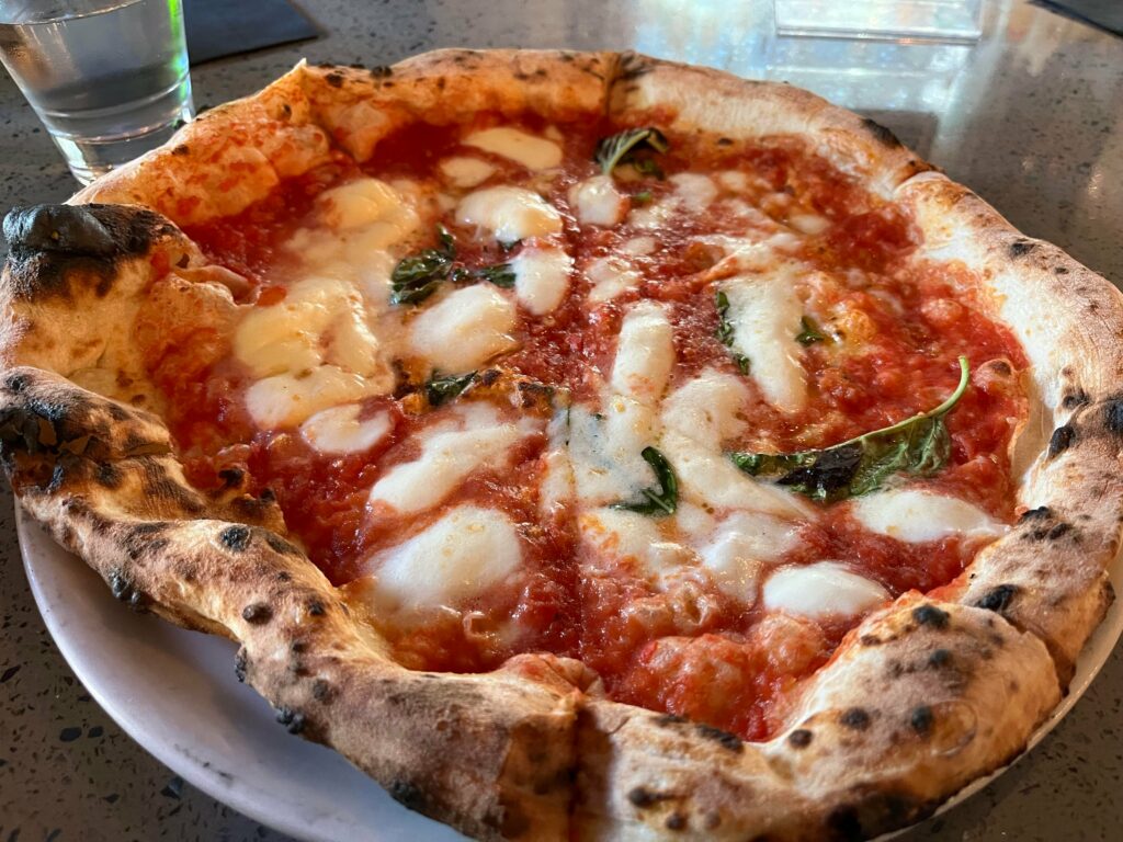 My local pizzeria. I need to learn this art.