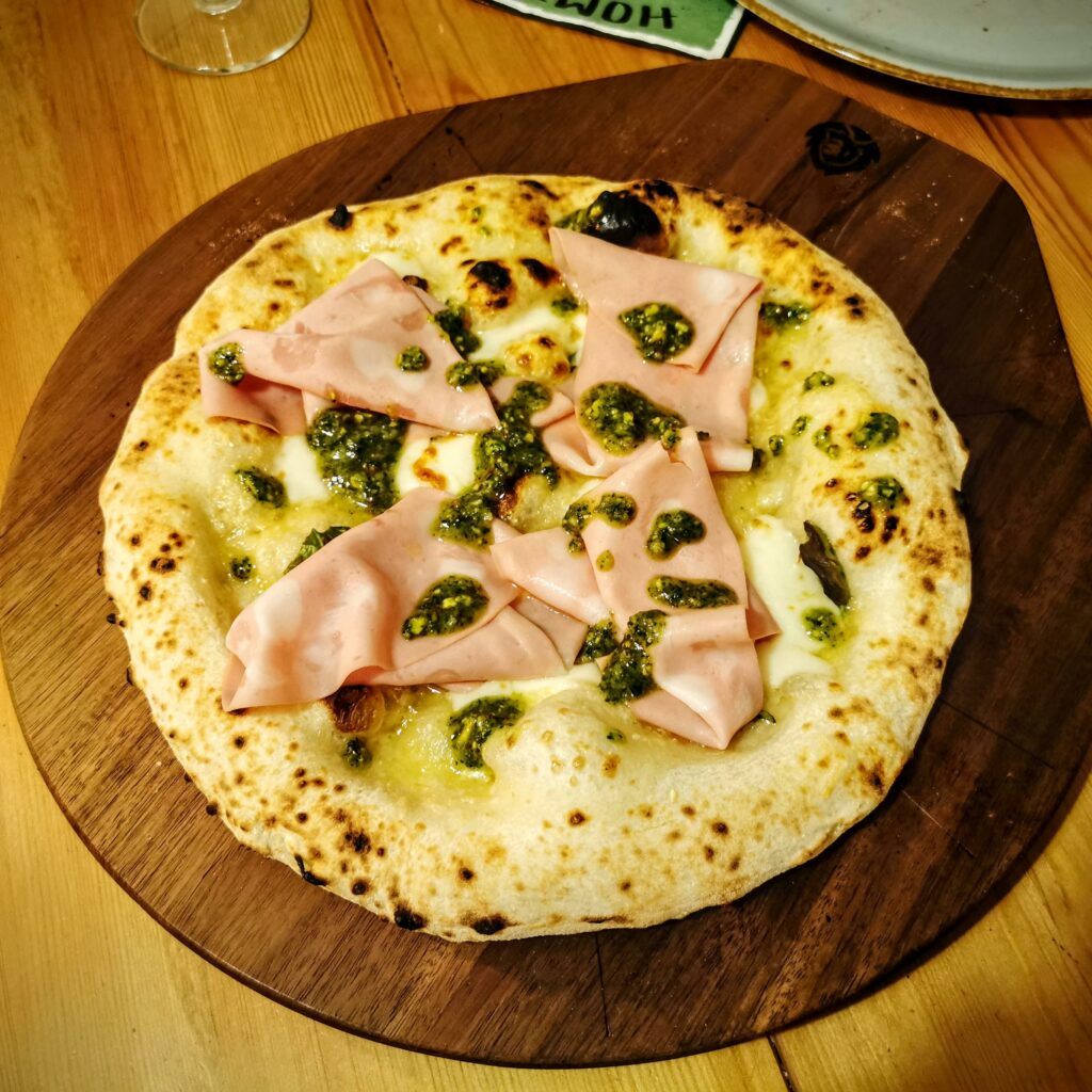 Bianca with Mortadella, Fior di Latte, Pistacio Pesto, Parmegiano