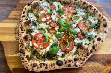 Basil pesto with fresh mozzarella and homegrown tomatoes and basil.