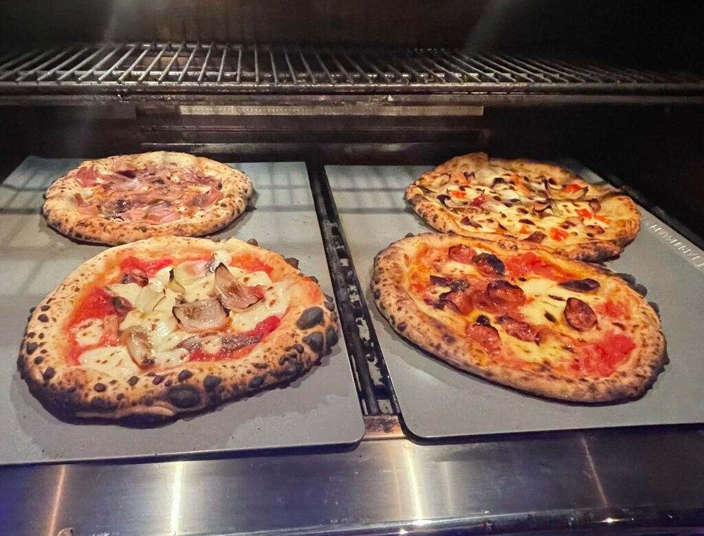 Pizzas at the warming station