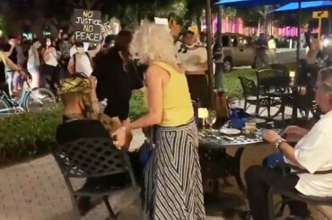 Couple Dining Outside Is Confronted by Protesters