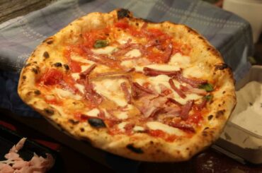 Pizza with Napoli salami and cooked ham