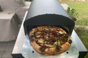 Today’s pizza trial run. Smoked Brisket, caramelized onion, tomatoes,jalapeño, white cheddar,smoked Gouda and mozzarella cheeses.