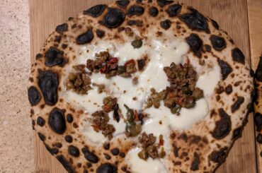 Progress! Pesto +shiitake, soppressata, white w/ mixed olive tapenade.