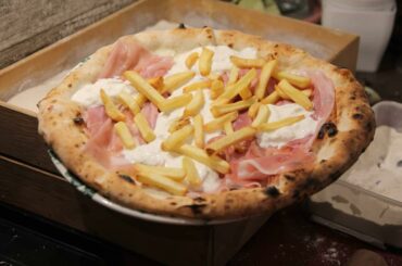 Pizza with fries, Parma ham and burrata stracciatella