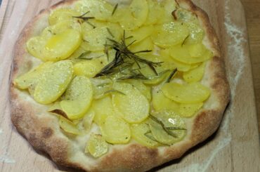 Tonight's dinner: Pizza with potatoes and rosemary + Pizza with burrata and anchovies
