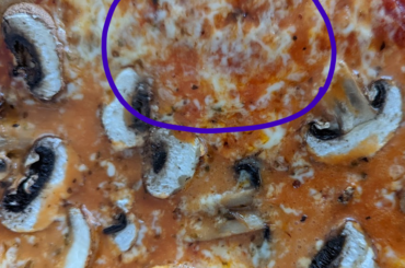Making Pizza in a electrical stone oven, how to prevent cheese from fusing into the sauce? Circle is pretty much what I want, at the bottom you see how sauce and cheese have become one.