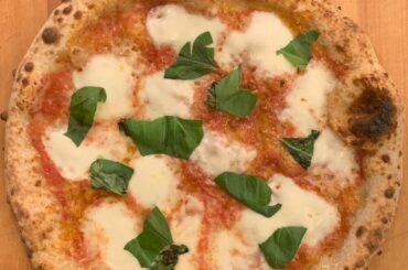 A couple of pizzas from last night: Margherita, and a smoked mozzarella/shallot/roasted garlic/rosemary