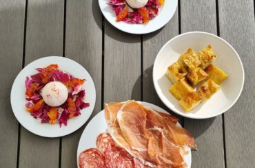 Homemade focaccia, salumi and a salad of burrata, blood orange and radicchio