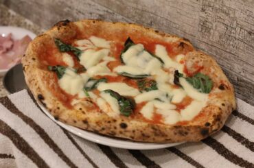 Fresh basil gives an exceptional aroma to pizza margherita