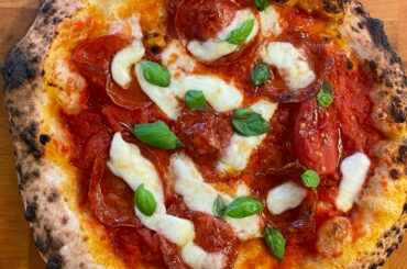 Lightly sauced then topped with whole Bianco DiNapoli tomatoes