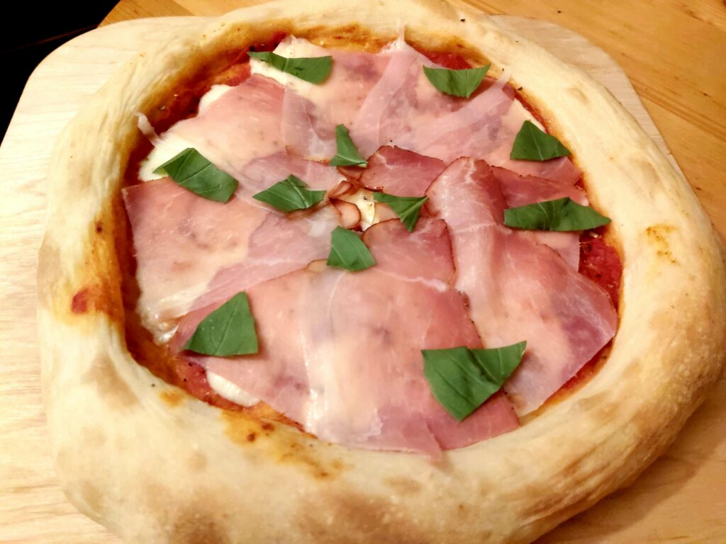 Smoked prosciutto, basil, garlic infused olive oil.