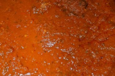 Making Mom's Sunday sauce.