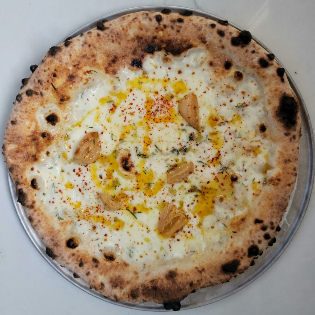 Confit garlic, chili oil, aleppo pepper.