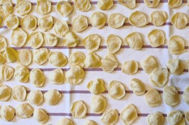 Homemade orecchiette con salsiccia e broccoli