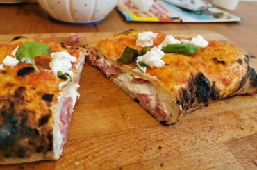 Calzone Neapolitan Style. Filled witch Ricotta, Mozarella, Salami.