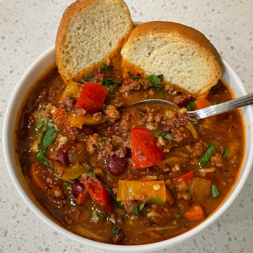My new favorite soup. My own recipe with Italian style sausage, veal, peppers, kidney beans, tomatoes and fennel.