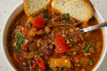 My new favorite soup. My own recipe with Italian style sausage, veal, peppers, kidney beans, tomatoes and fennel.