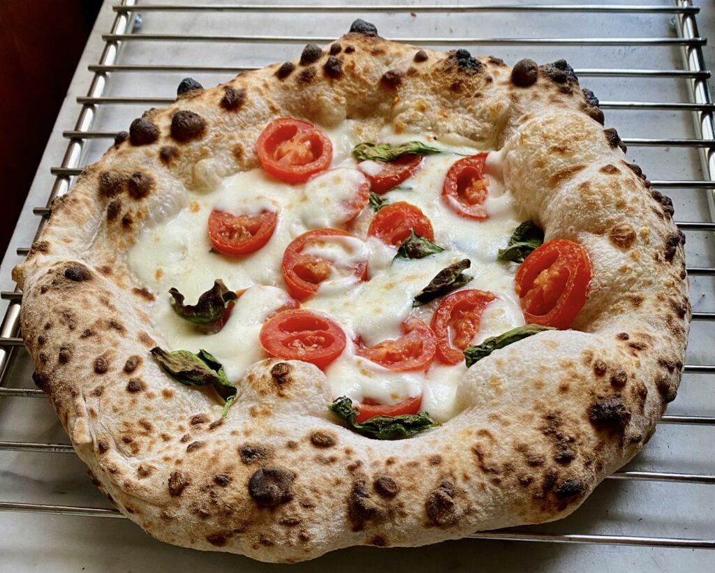 50%Tipo1, 50%Tipo0. 70%Hydration. 2.2%Salt. 0.1%Fresh yeast. 80h total fermentation. Baked in a Alfa One oven