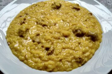 Risotto allo zafferano with mixed dried mushrooms and luganega bits