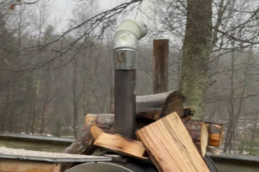 Trying to make pizza in the rain with the Expert Grill 15” charcoal pizza oven