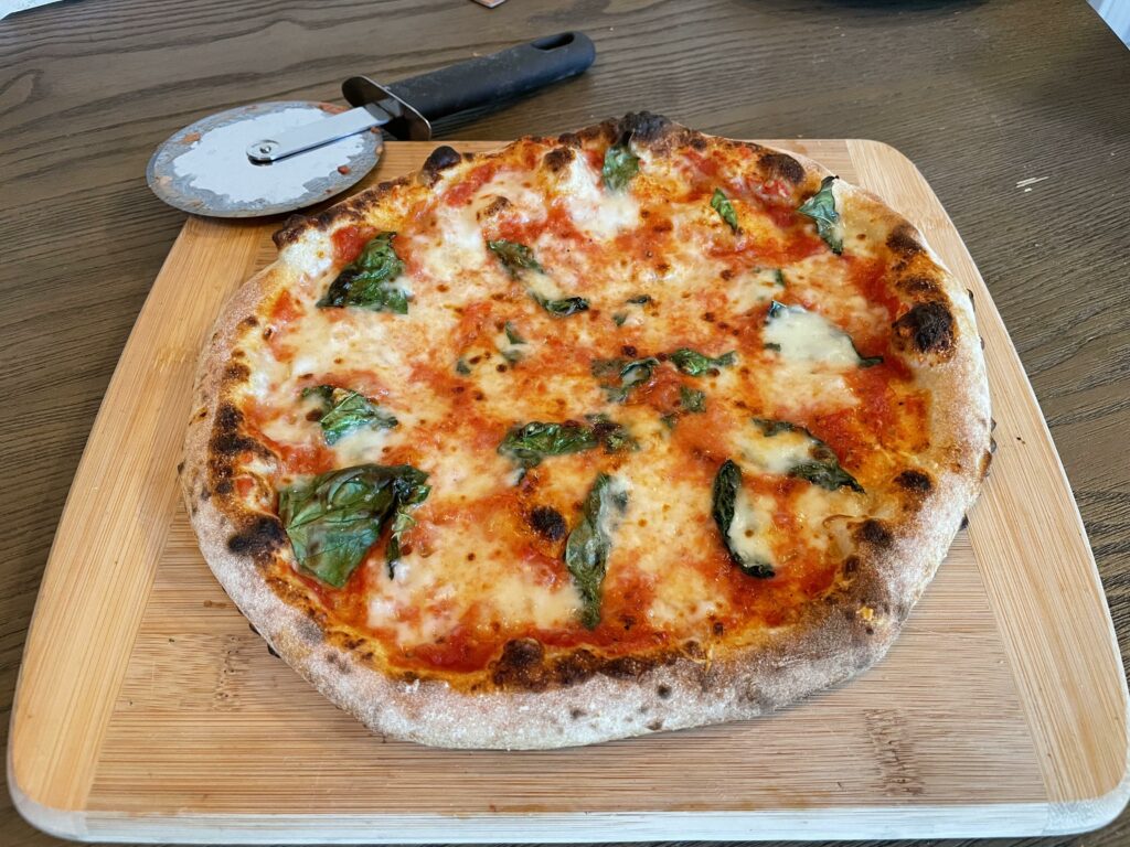 I perfected my Neapolitan - but looking for a *less* chewy and more crispy dough - how?