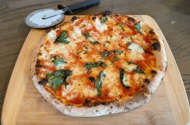I perfected my Neapolitan - but looking for a *less* chewy and more crispy dough - how?