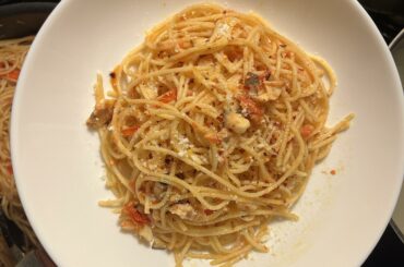 Just some spaghetti with scratch made light tomato sauce and mushrooms.