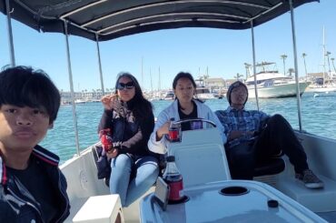 Spring break fun family boat cruise at Balboa Island in Newport Beach California