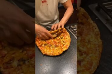 Giving my Iron Chef Dad Dominoes Pizza...