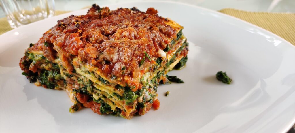 Fresh lasagne with ragú, bechamel, spinach and lots of Parmigianino cheese