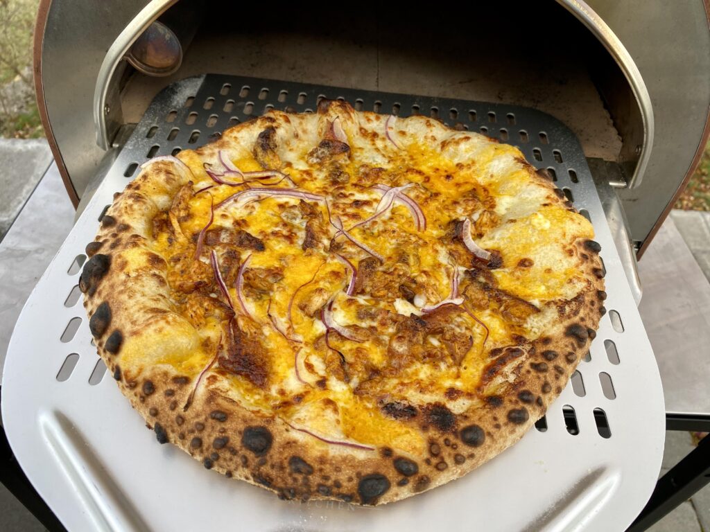 Buffalo chicken, red onions and cheddar and mozzarella cheese’s.