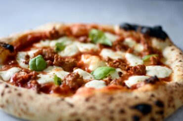 Spicy sausage Neapolitan pizza from poolish, baked in the Carbon oven.