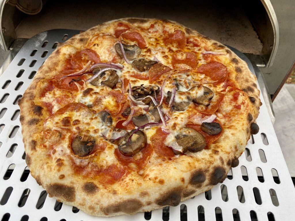 Pepperoni, mushrooms and red onion with mozzarella cheese.