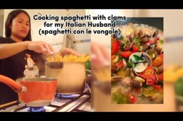 Cooking spaghetti with clams (spaghetti con le vongole)