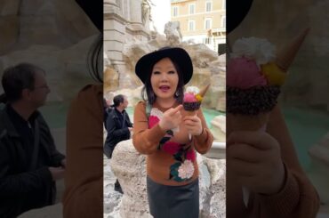 Eating gelato in front of Trevi Fountain in Rome, Italy!