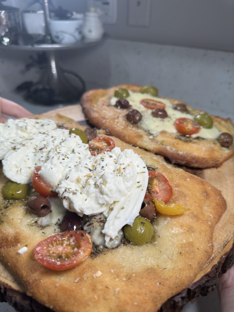 Homemade tart? Herb based with Italian olives and burrata