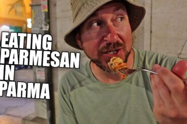 Walking at night in Busy Parma, Italy