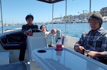 Relaxing family boat cruise at Balboa Island in Newport Beach California